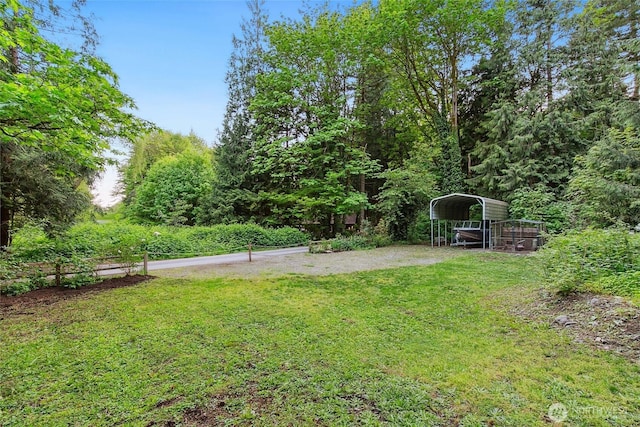 24016 SE 111th St, Issaquah, WA 98027 - view of green lawn featuring a carport