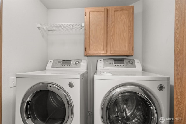 5221 Ivy Hill Ln SE, Lacey, WA 98513 - laundry area with cabinet space and washing machine and dryer