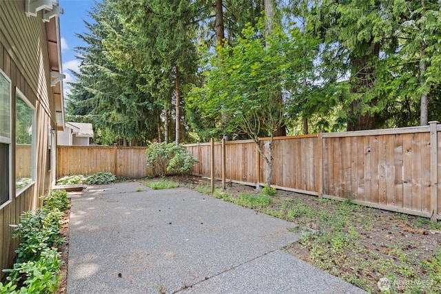 5221 Ivy Hill Ln SE, Lacey, WA 98513 - fenced backyard featuring a patio