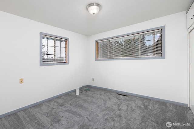 1108 123rd St S, Tacoma, WA 98444 - carpeted spare room featuring baseboards