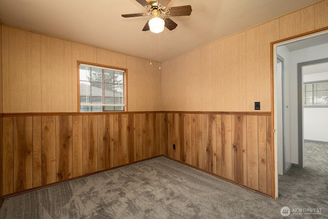 1108 123rd St S, Tacoma, WA 98444 - unfurnished room featuring carpet floors, ceiling fan, and wooden walls