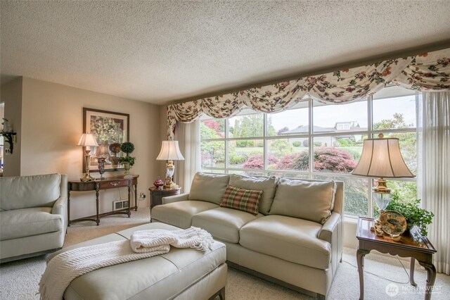 605 Lee Ave, Aberdeen, WA 98520 - living area with a textured ceiling and light colored carpet
