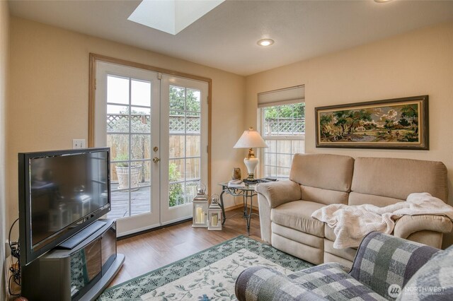 605 Lee Ave, Aberdeen, WA 98520 - living area with french doors, a skylight, wood finished floors, and recessed lighting