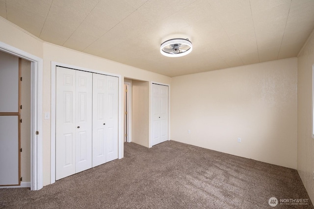 357 7th Ave SW, Ephrata, WA 98823 - unfurnished bedroom with carpet flooring and multiple closets