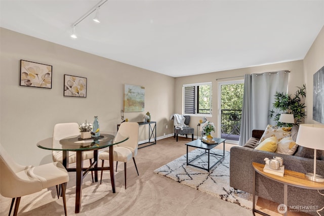 275 W Roy St Unit 319, Seattle, WA 98119 - living area with track lighting and light colored carpet