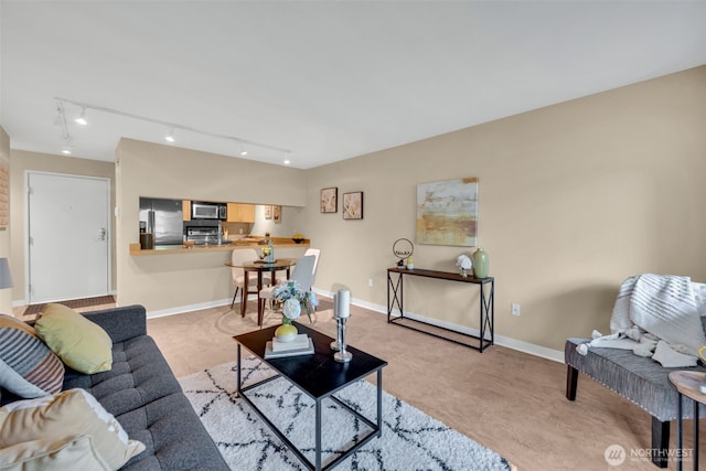 275 W Roy St Unit 319, Seattle, WA 98119 - living area with rail lighting and baseboards