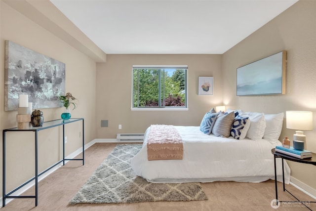 275 W Roy St Unit 319, Seattle, WA 98119 - bedroom featuring a baseboard heating unit and baseboards