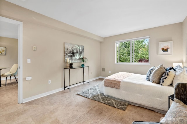 275 W Roy St Unit 319, Seattle, WA 98119 - bedroom featuring baseboards