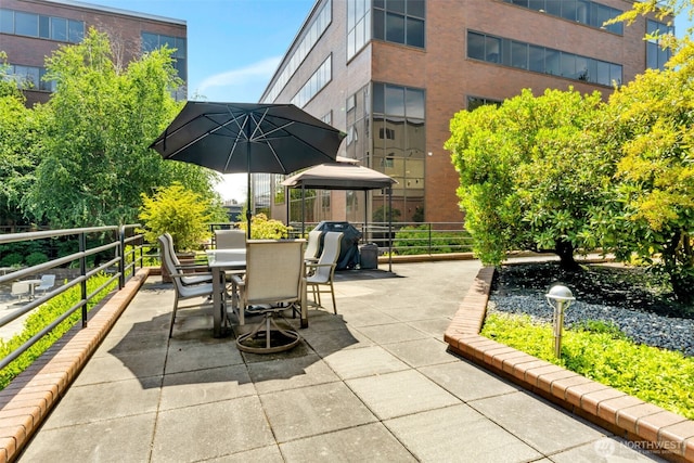 275 W Roy St Unit 319, Seattle, WA 98119 - view of patio / terrace featuring outdoor dining space