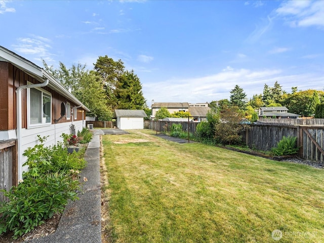 6702 120th St E, Puyallup, WA 98373 - fenced backyard featuring a storage shed