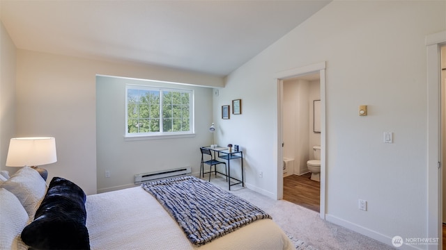 10619 SE 261st Pl Unit E303, Kent, WA 98030 - carpeted bedroom featuring a baseboard heating unit, lofted ceiling, and connected bathroom