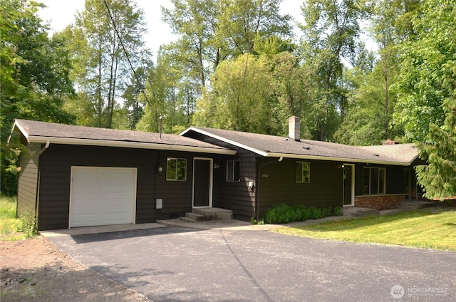 3428 99th Ave NE, Lake Stevens, WA 98258 - ranch-style home with an attached garage, a chimney, driveway, and roof with shingles