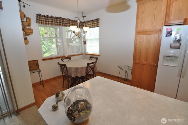 1750 Grand Ave, Mount Vernon, WA 98274 - dining area with a chandelier and wood finished floors