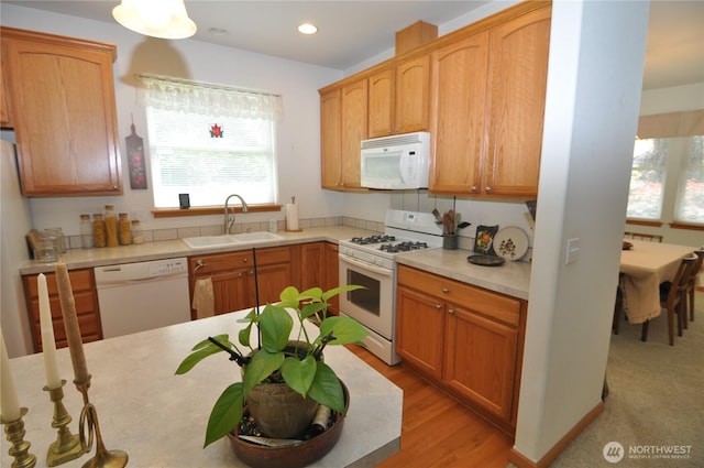 1750 Grand Ave, Mount Vernon, WA 98274 - kitchen with white appliances, light countertops, plenty of natural light, light wood-style floors, and recessed lighting