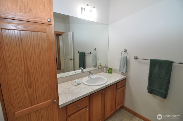 1750 Grand Ave, Mount Vernon, WA 98274 - bathroom featuring vanity and baseboards