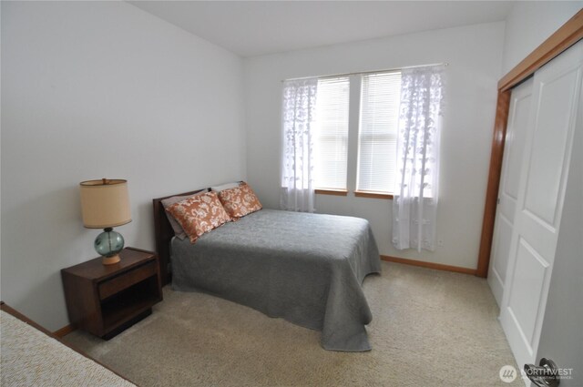 1750 Grand Ave, Mount Vernon, WA 98274 - carpeted bedroom featuring baseboards and a closet