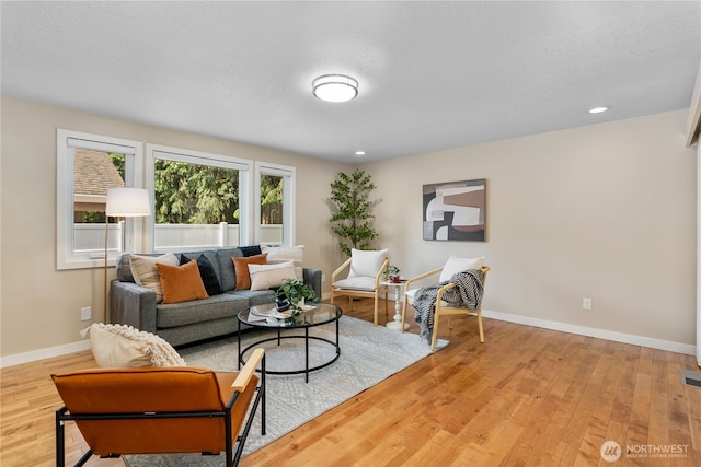 3200 SE Balboa Dr, Vancouver, WA 98683 - living room featuring light wood finished floors and recessed lighting