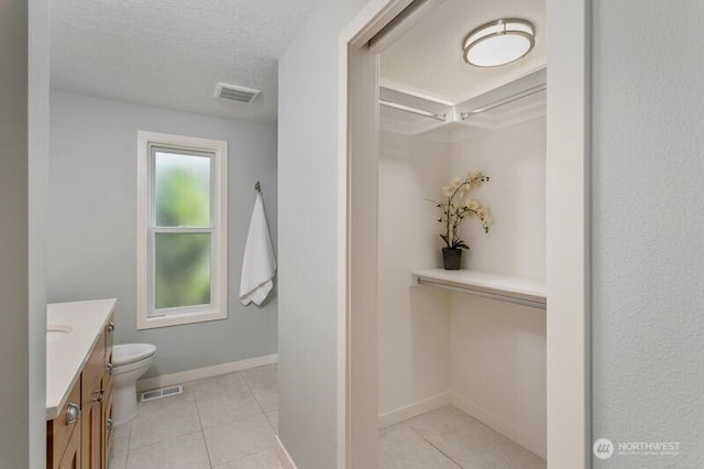 3200 SE Balboa Dr, Vancouver, WA 98683 - full bathroom with vanity, tile patterned floors, and a shower
