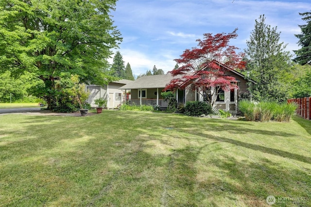 4623 224th St SE, Bothell, WA 98021 - view of property hidden behind natural elements featuring a porch