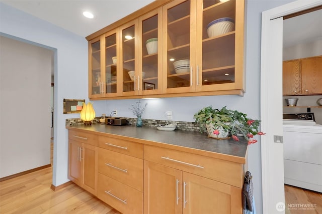 4623 224th St SE, Bothell, WA 98021 - bar area featuring washer / clothes dryer, light wood finished floors, and recessed lighting