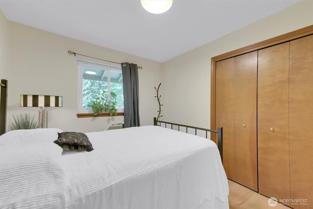 4623 224th St SE, Bothell, WA 98021 - bedroom featuring a closet and light wood-style flooring