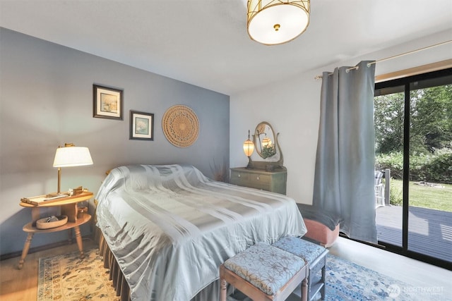 4623 224th St SE, Bothell, WA 98021 - bedroom featuring access to exterior and wood finished floors