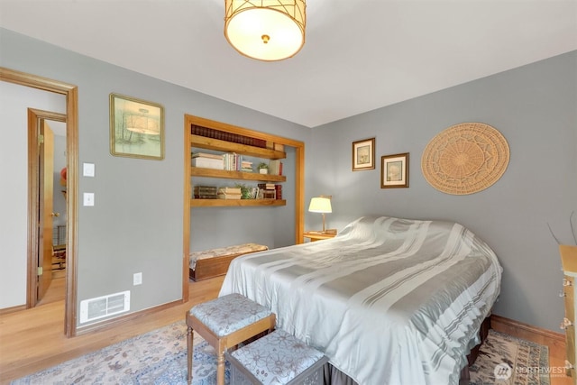 4623 224th St SE, Bothell, WA 98021 - bedroom featuring wood finished floors and baseboards