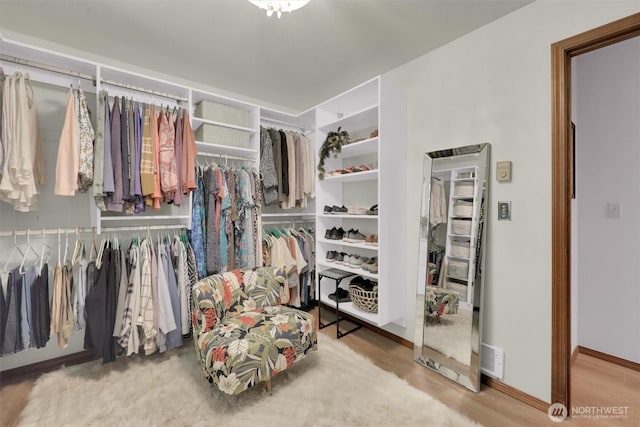4623 224th St SE, Bothell, WA 98021 - walk in closet featuring wood finished floors