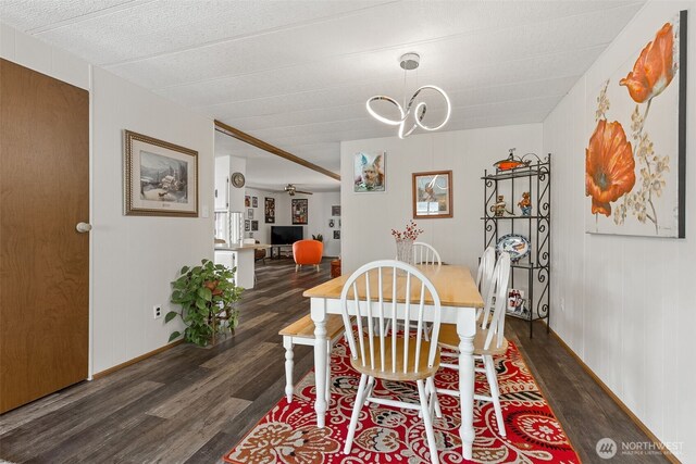 4707 Black Lake Belmore Rd SW Unit 50, Olympia, WA 98512 - dining space with wood finished floors and a chandelier