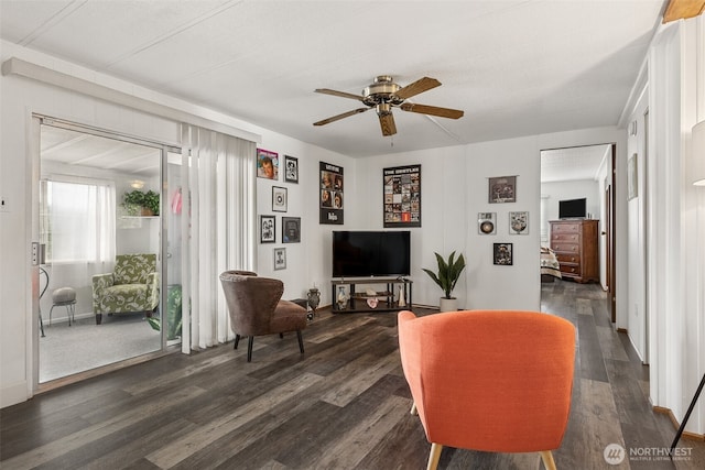 4707 Black Lake Belmore Rd SW Unit 50, Olympia, WA 98512 - living area with dark wood-style floors and a ceiling fan