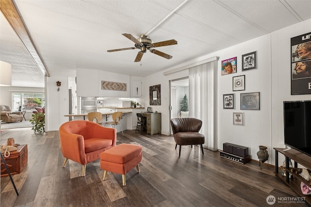 4707 Black Lake Belmore Rd SW Unit 50, Olympia, WA 98512 - living area with dark wood finished floors and a ceiling fan