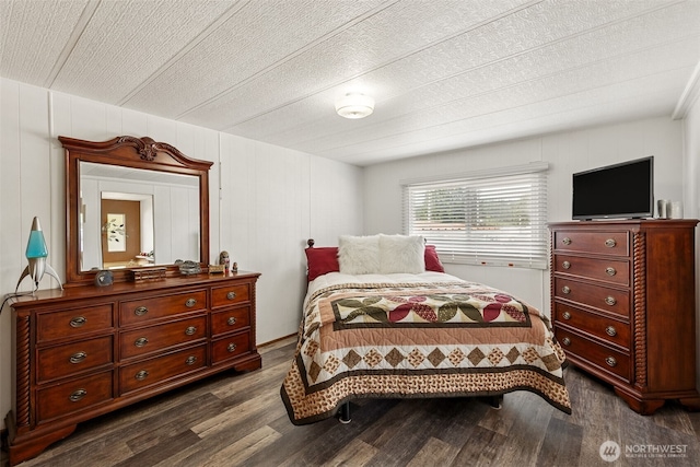 4707 Black Lake Belmore Rd SW Unit 50, Olympia, WA 98512 - bedroom featuring dark wood-style floors and a textured ceiling