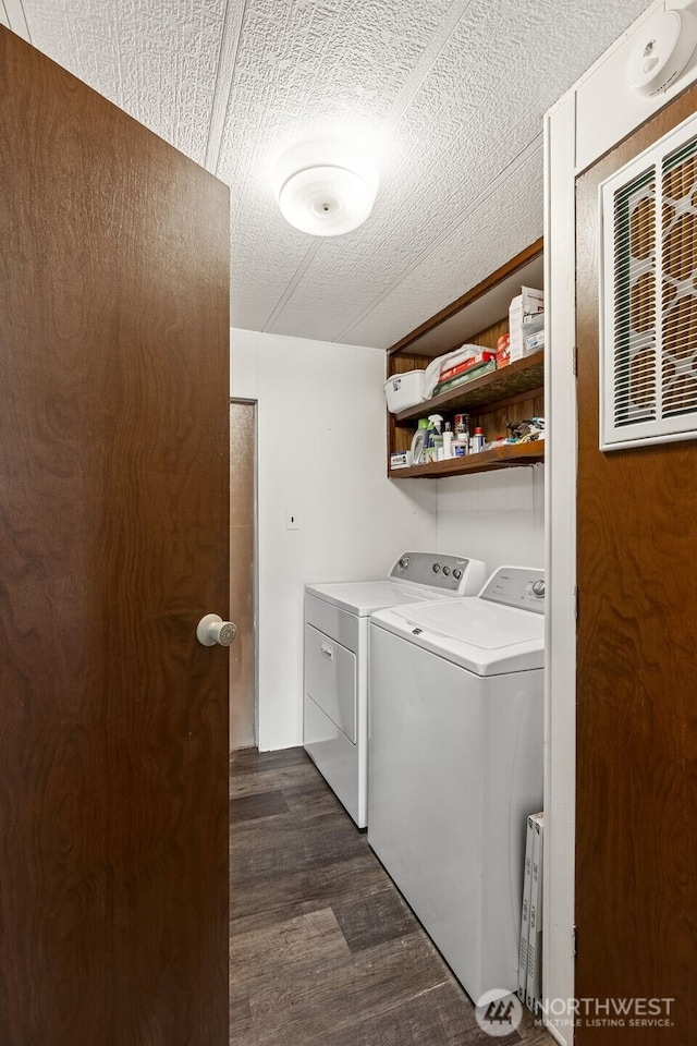 4707 Black Lake Belmore Rd SW Unit 50, Olympia, WA 98512 - washroom featuring washer and clothes dryer and dark wood-style floors