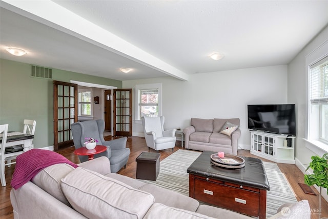 614 16th St SW, Puyallup, WA 98371 - living area featuring wood finished floors and baseboards
