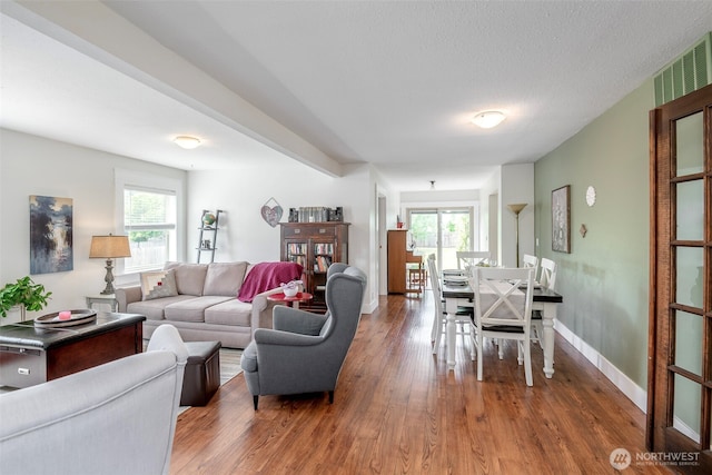 614 16th St SW, Puyallup, WA 98371 - living area with wood finished floors and healthy amount of natural light