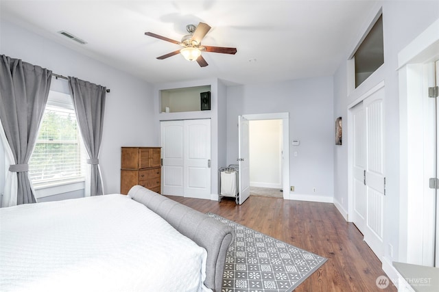 614 16th St SW, Puyallup, WA 98371 - bedroom with wood finished floors and a ceiling fan