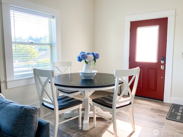 614 16th St SW, Puyallup, WA 98371 - dining room with healthy amount of natural light and light wood-style floors