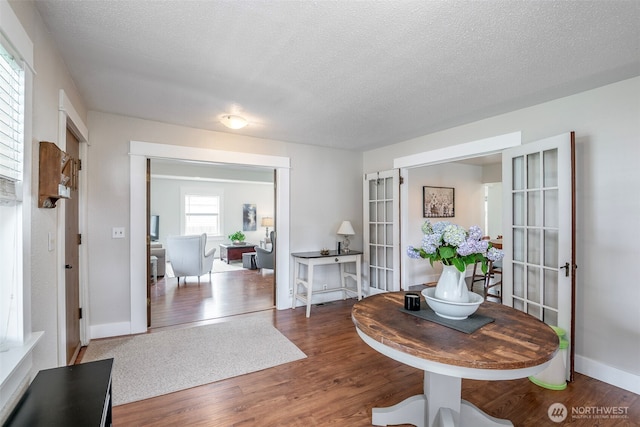 614 16th St SW, Puyallup, WA 98371 - entrance foyer featuring wood finished floors, french doors, and a textured ceiling
