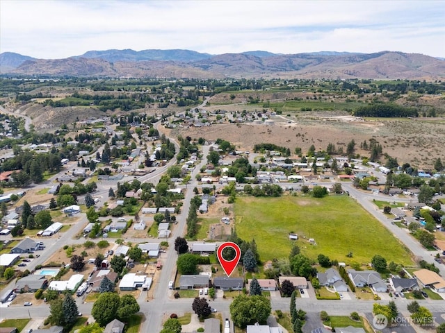 707 Kenwood St N, Omak, WA 98841 - aerial overview of property's location featuring mountains