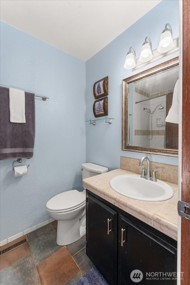 707 Kenwood St N, Omak, WA 98841 - full bathroom featuring vanity and a shower