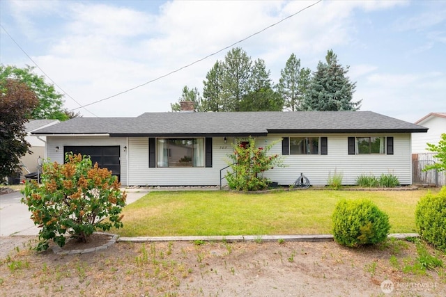 707 Kenwood St N, Omak, WA 98841 - ranch-style house featuring an attached garage, a front lawn, a chimney, and concrete driveway