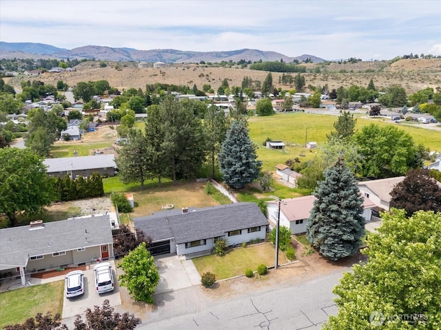 707 Kenwood St N, Omak, WA 98841 - aerial perspective of suburban area featuring a mountain backdrop