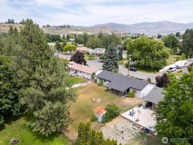 707 Kenwood St N, Omak, WA 98841 - aerial view of property and surrounding area featuring a mountainous background