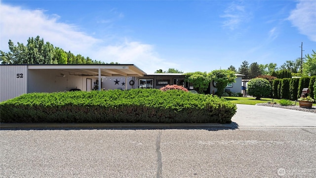 3324 W 19th Ave W Unit 52, Kennewick, WA 99338 - view of front of house featuring a carport