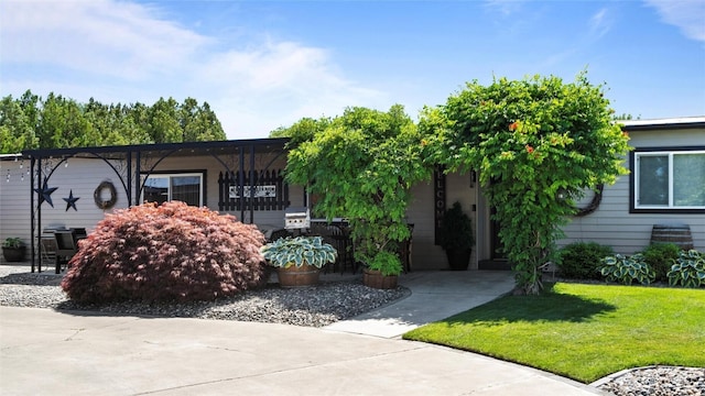 3324 W 19th Ave W Unit 52, Kennewick, WA 99338 - view of front of home featuring a front lawn