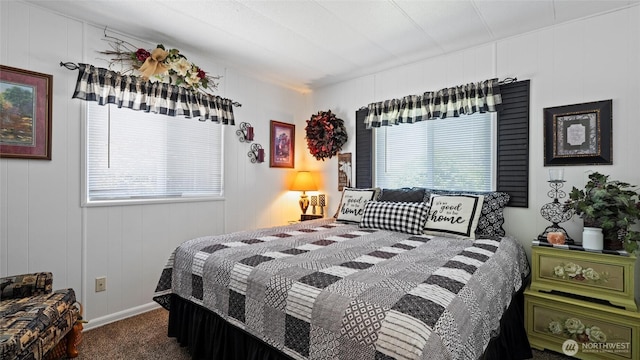 3324 W 19th Ave W Unit 52, Kennewick, WA 99338 - carpeted bedroom with a decorative wall