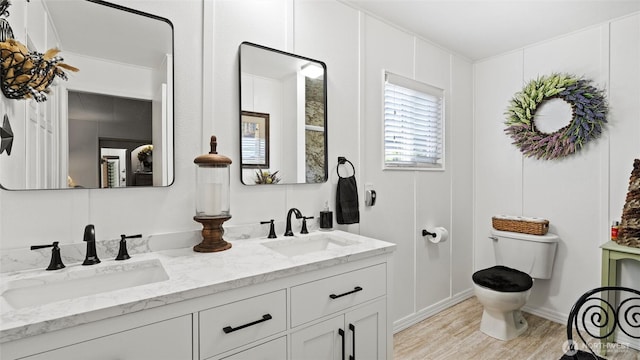 3324 W 19th Ave W Unit 52, Kennewick, WA 99338 - bathroom with double vanity and wood finished floors
