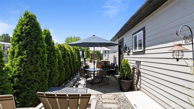 3324 W 19th Ave W Unit 52, Kennewick, WA 99338 - view of patio / terrace with outdoor dining space