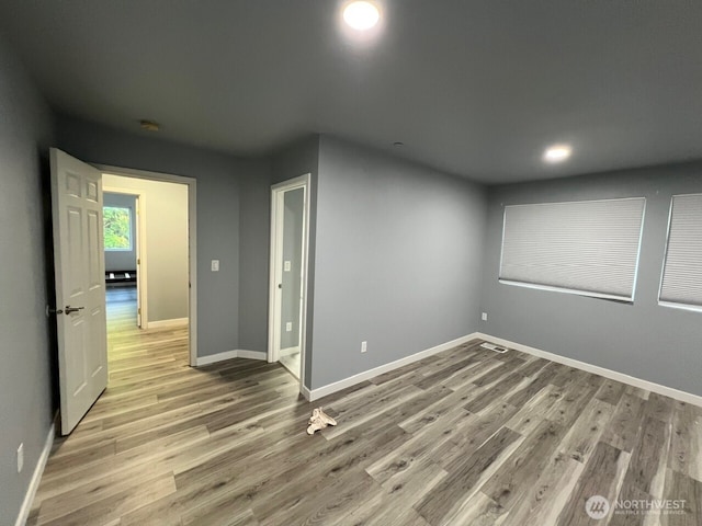 9525 S 221st Pl, Kent, WA 98031 - empty room with light wood finished floors and recessed lighting