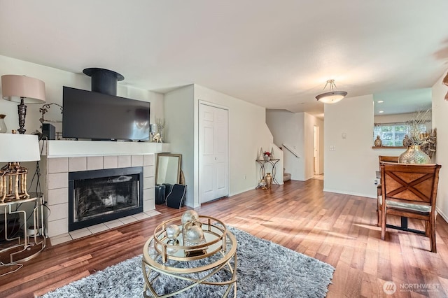 2100 S 336th St Unit M1, Federal Way, WA 98003 - living area with wood finished floors and a tiled fireplace